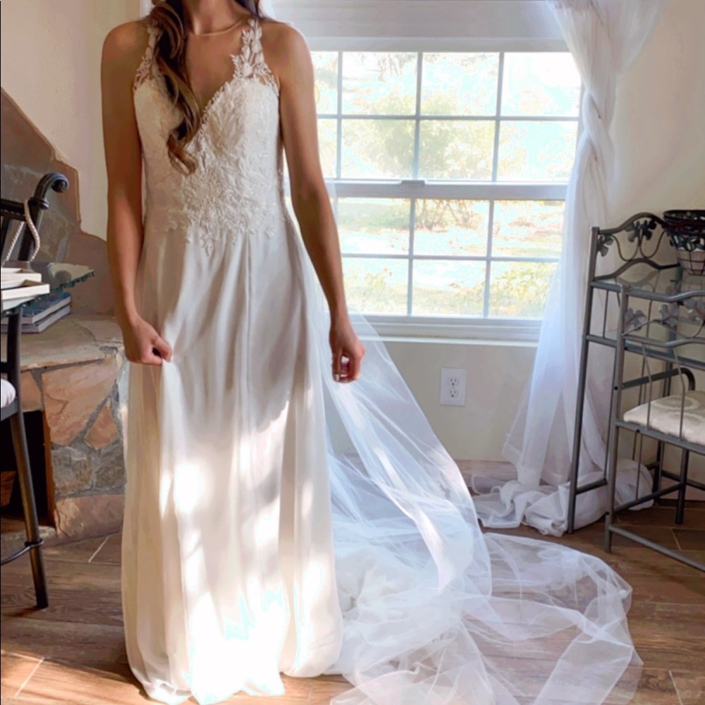 Lillian West Justin Alexander wedding dress 66154